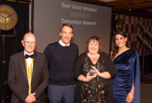 Professor Russel Griggs of SOSE, Rob Longworth and Frances Mann of Trimontium Museum and awards host Lori Carnochan at the 2023 South of Scotland Thistle Awards.
